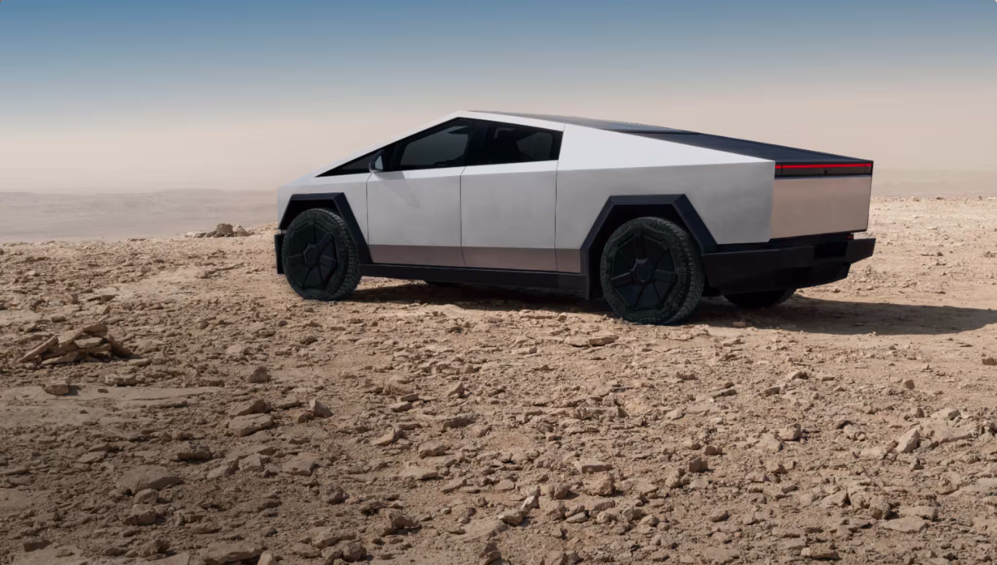 Modern house with solar panels and Tesla car